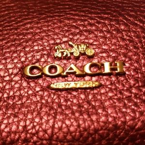 Coach crossbody in metallic wine.